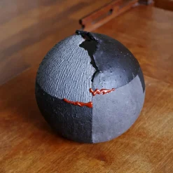 #114 Black Sphere with Red Lacquer Accents