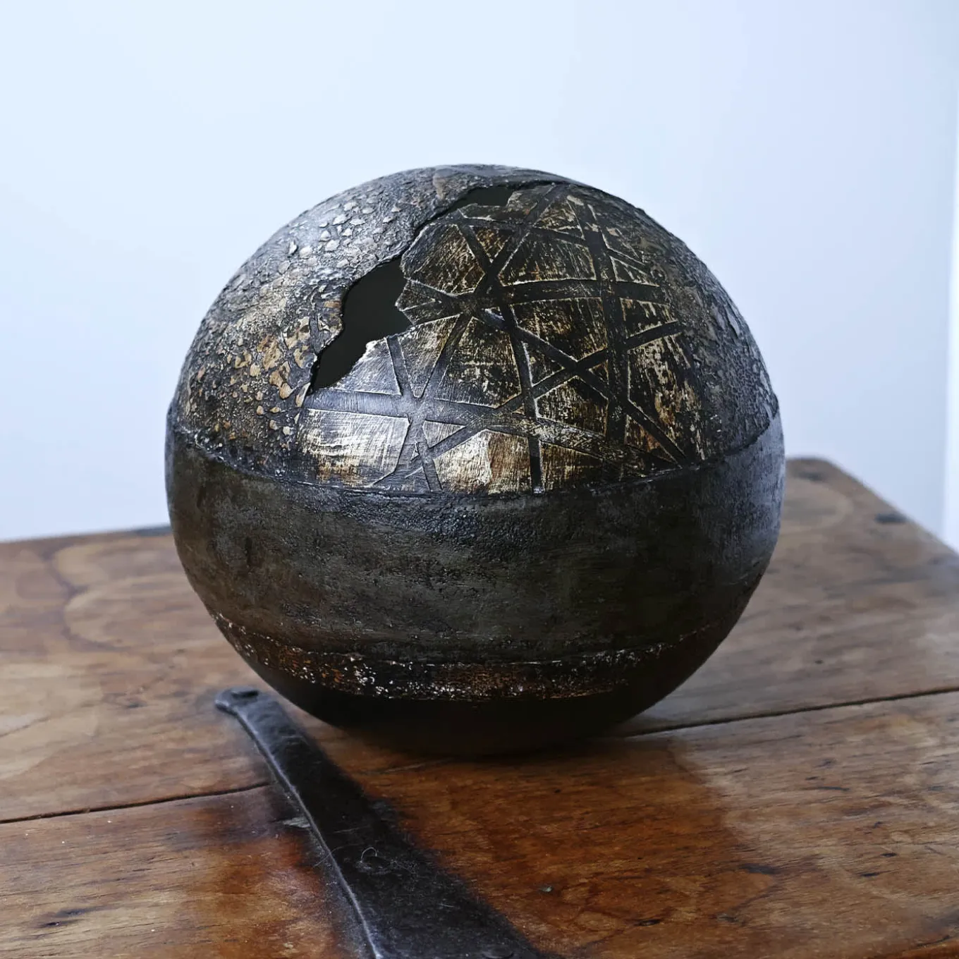 #96 Brown Globe with Geometric and Floral Reliefs