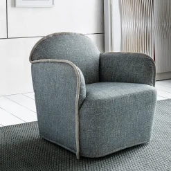 Ada Light Blue Fabric And Piping Armchair by Paola Navone