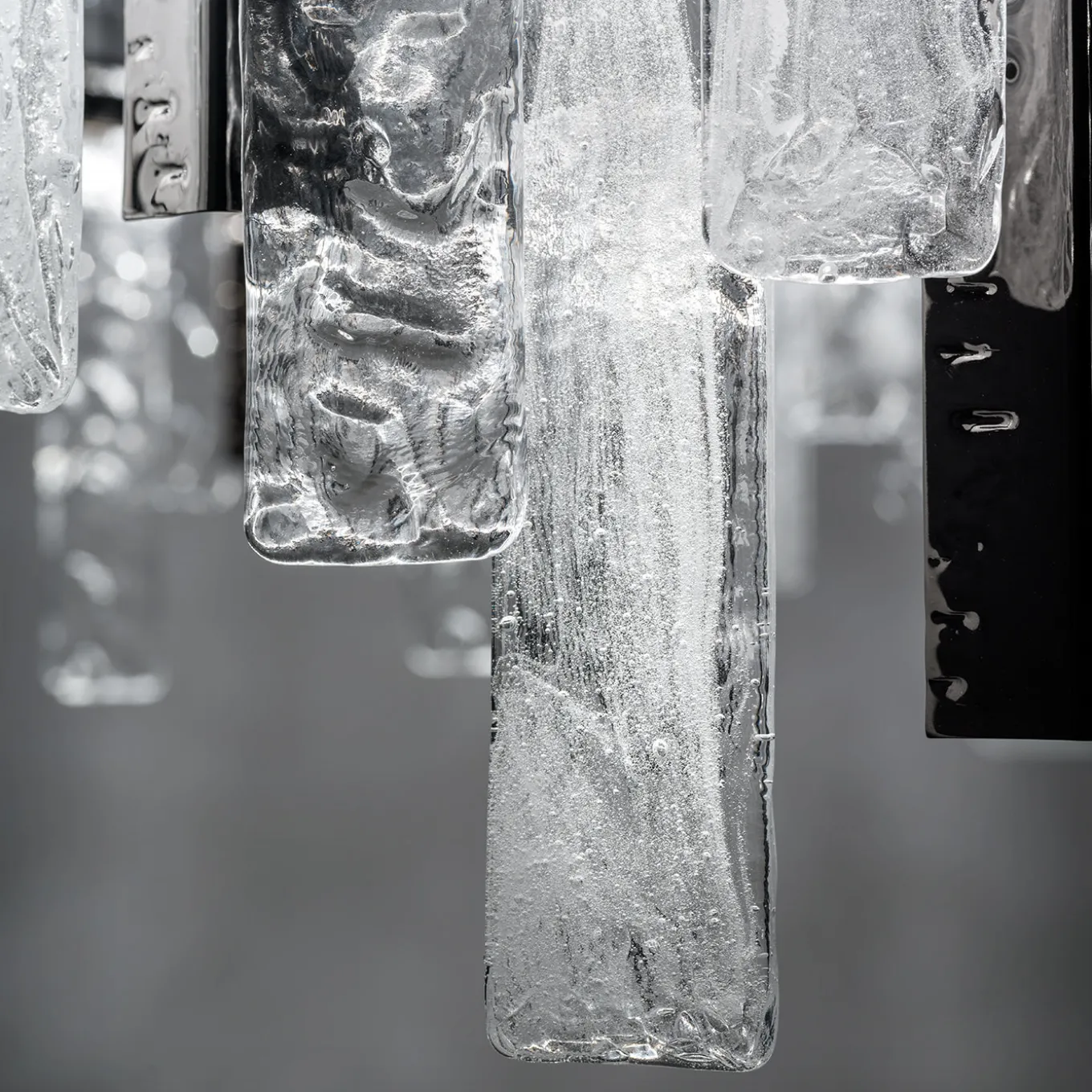 Artic Chandelier with metal frame and clear pulegoso and hammered glass