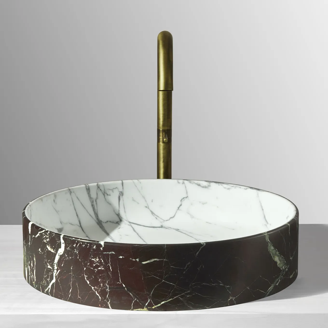 Blessed Circle Washbasin in Rosso Lepanto and Calacatta Carrara