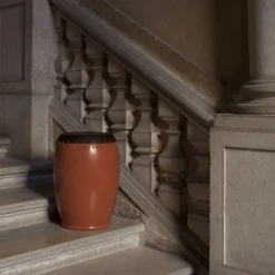 Bombo Brown and Red Stool e by Nestor Perkal