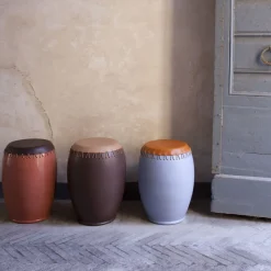 Bombo Brown and Red Stool e by Nestor Perkal