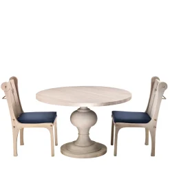 Ferne Round Outdoor Dining Table by Archer Humphryes Architects