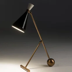 Flipper burnished brass table lamp with black cone