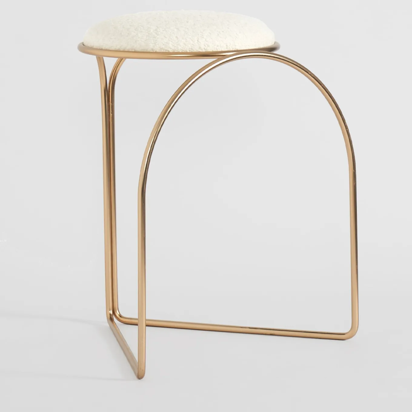 FLOW SCULPTURAL GOLD AND WHITE LOW STOOL