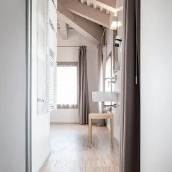 Shira Low Stool in Oak by Lorenz+Kaz