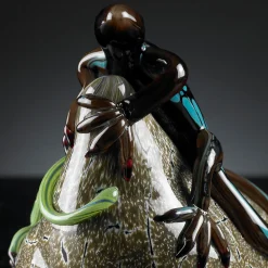 Two Glass Green Lizards on Stone