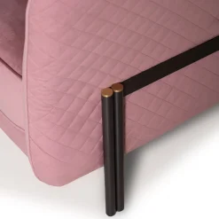 Universal pink velvet armchair